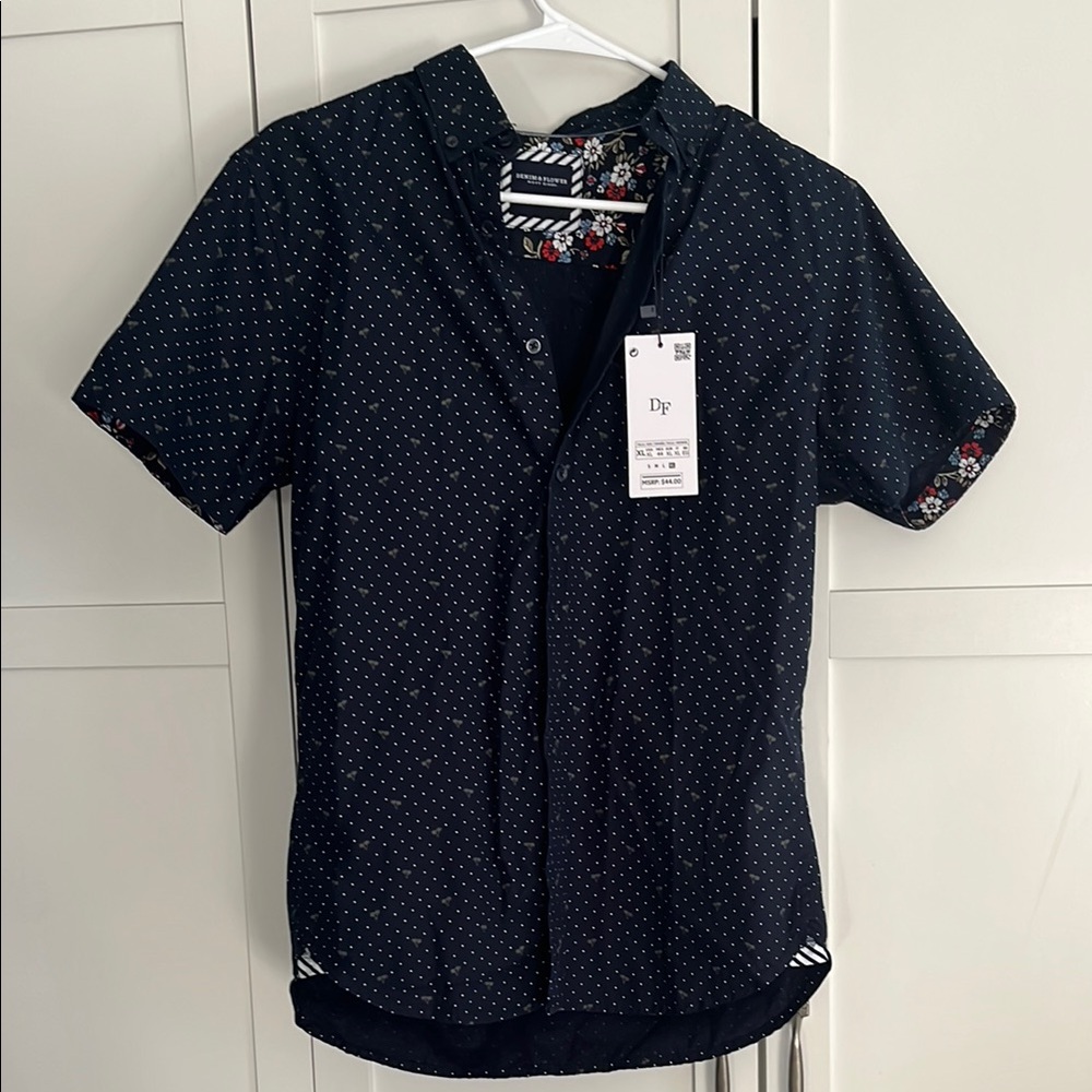 Young men’s navy polka dot and palm tree shirt